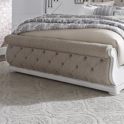 Magnolia Manor - Queen Upholstered Sleigh Footboard - Antique White